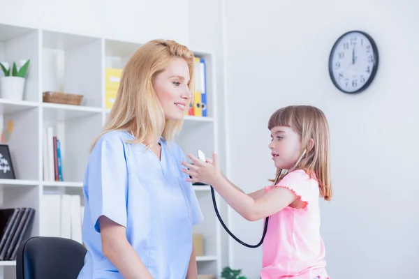 Cute little girl at doctor\'s office