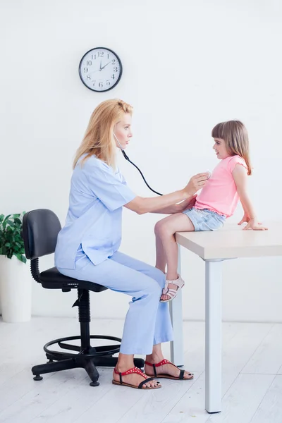 Cute little girl at doctor\'s office
