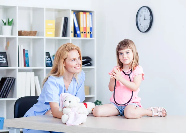 Cute little girl at doctor\'s office