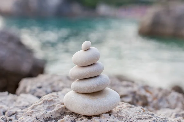 Balance stones on sea coast