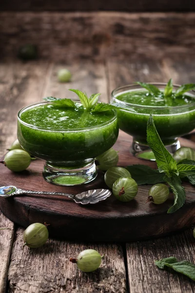 Healthy green fresh fruit and vegetable juice smoothie breackfast