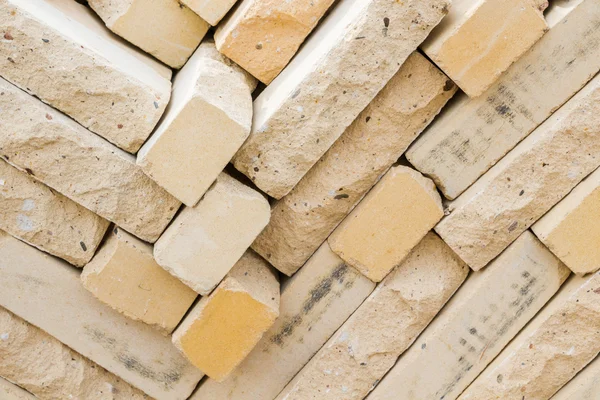 Facing bricks stacked in a warehouse building base