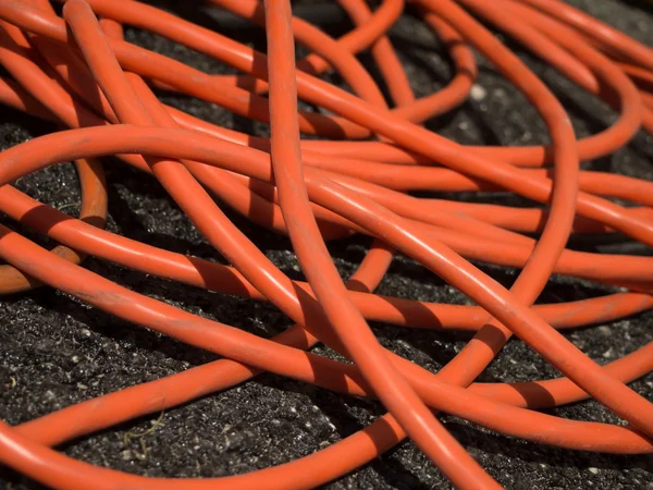 The Orange Extrnsion Cord on the Ground at the Constructionsite