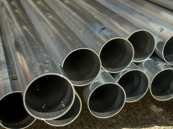 Stack of Many Pipes at the Construction Site