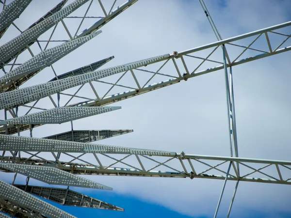 Detail And Structure of Ferris Wheel with Blue Sky