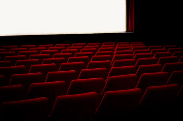 Red chairs in the cinema theater