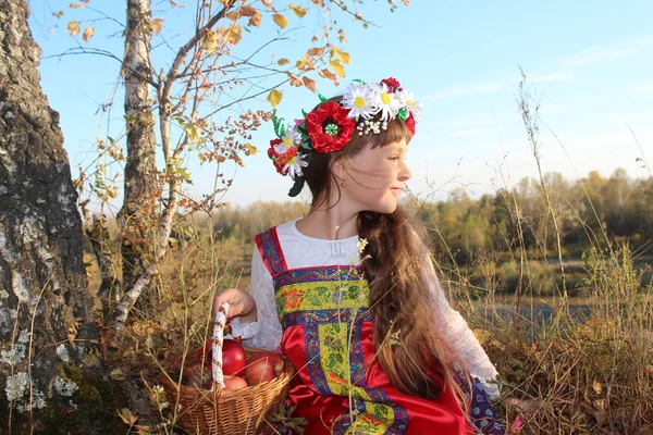 Russian beauty in the autumn forest