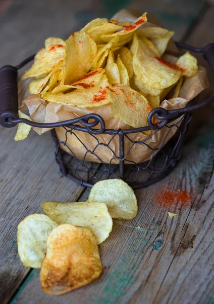 Potato chips in a metal basket