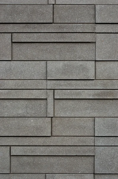 Brick walls are arranged in a straight pattern background.