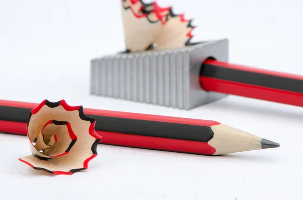 Lead pencils with sharpener on white background