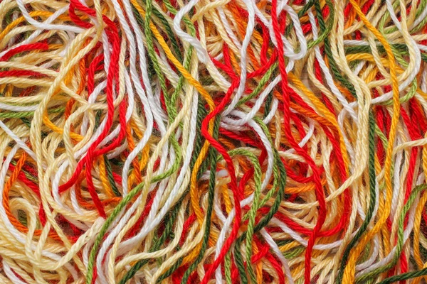 Multi-colored woolen thread.