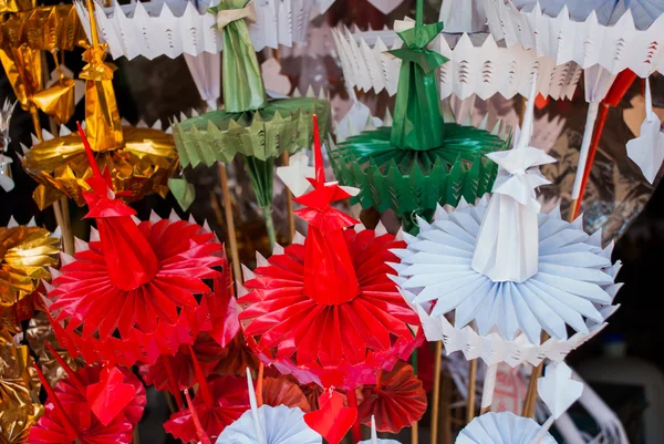 Colorful religious decoration made from foil and paper. Myanmar. Burma.