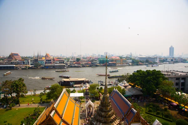 View of the city from above.River, houses and temples.View from the bird\'s flight.Bangkok.Thailand