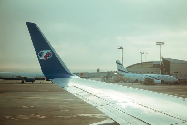 Travel Service airline commercial plane wing and El Al airline c