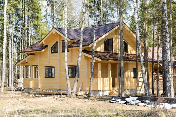 New wooden country house in forest