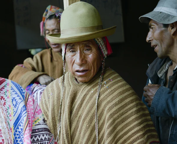 Portrait of a Native Peruvian man wearing typical andean robe