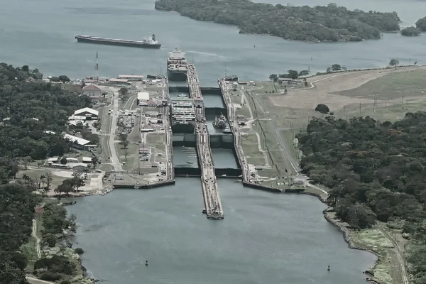 Cargo ships passing through Gatun Locks on the Atlantic side of the Panama Canal