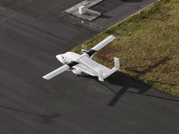 Single Engine Airplane on a airport runway ready for taking off