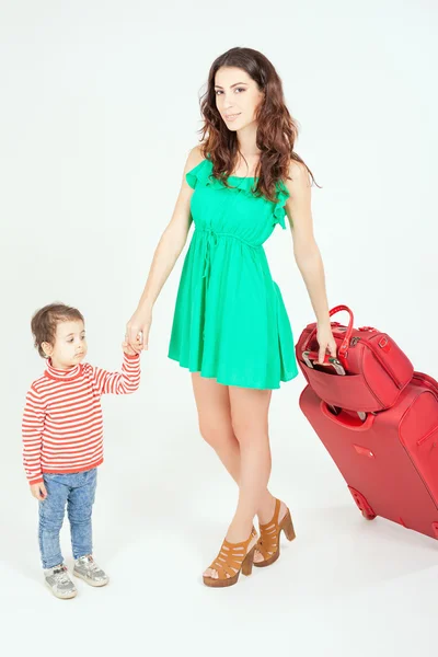 Child with mother ready to travel to Europe, Italy