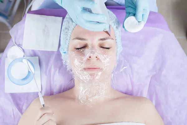 Woman in spa salon receive skin treatment.
