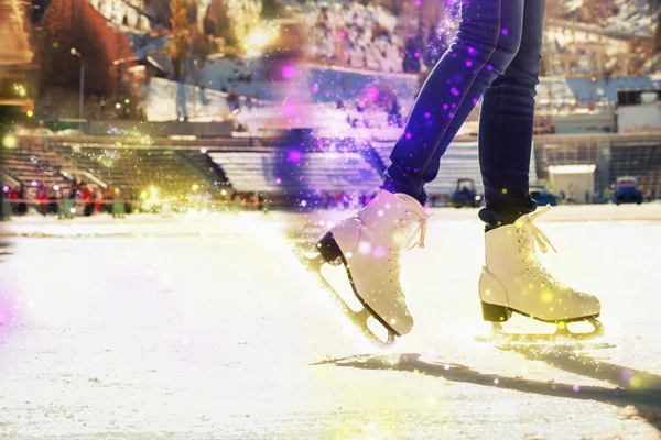 Closeup skating shoes ice skating outdoor at ice rink