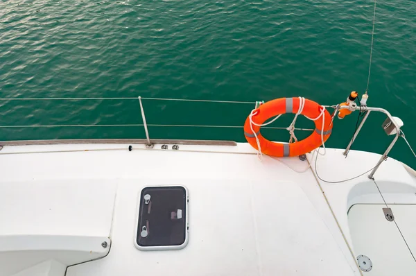 Life buoy on a yacht deck