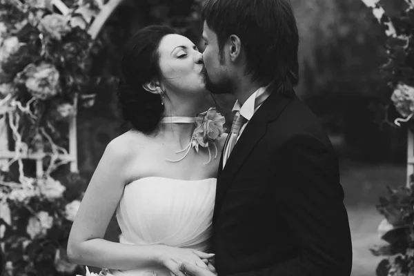 Happy bride and groom kissing