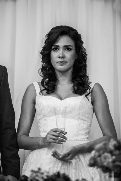 Bride tearing up during a toast