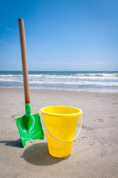 Shovel and pail toys at the beach.