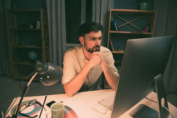 Ponder strict man thinking about way to complete his job