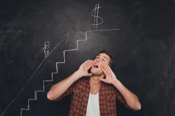 Young man screaming  against picture of his future career stairs