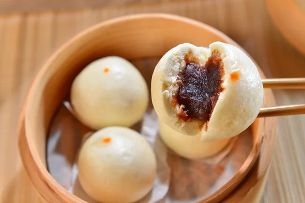 Dumplings of dense Dousha on bamboo tray in restaurant