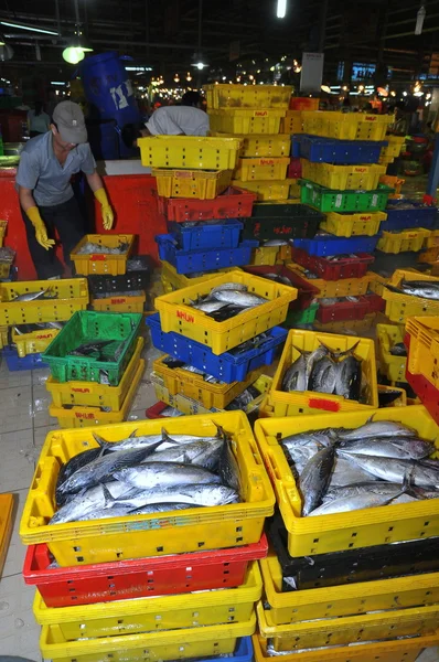 Ho Chi Minh City, Vietnam - November 28, 2013: Plenty of fisheries in baskets are waiting for purchasing at the Binh Dien wholesale night seafood market, the biggest one in Ho Chi Minh city, Vietnam