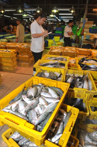 Ho Chi Minh City, Vietnam - November 28, 2013: Plenty of fisheries in baskets are waiting for purchasing at the Binh Dien wholesale night seafood market, the biggest one in Ho Chi Minh city, Vietnam