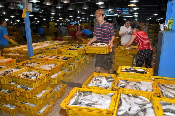 Ho Chi Minh City, Vietnam - November 28, 2013: Plenty of fisheries in baskets are waiting for purchasing at the Binh Dien wholesale night seafood market, the biggest one in Ho Chi Minh city, Vietnam