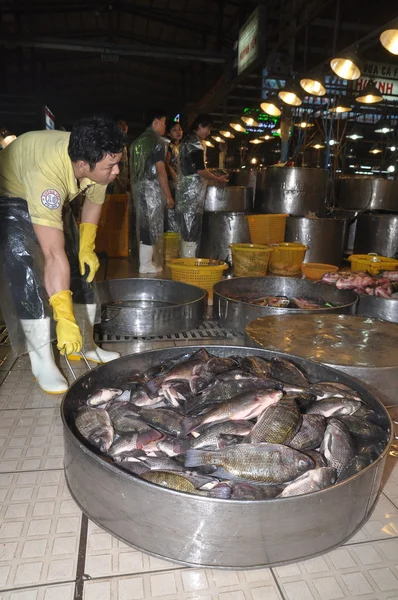 Ho Chi Minh City, Vietnam - November 28, 2013: Plenty of fisheries in tanks are waiting for purchasing at the Binh Dien wholesale seafood market, the biggest one in Ho Chi Minh city, Vietnam