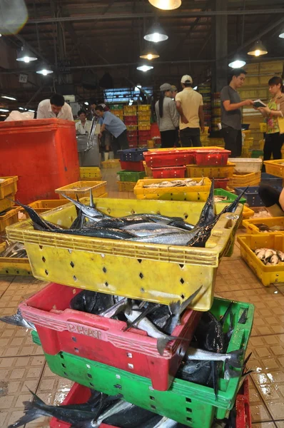 Ho Chi Minh City, Vietnam - November 28, 2013: Plenty of fisheries in baskets are waiting for purchasing at the Binh Dien wholesale night seafood market, the biggest one in Ho Chi Minh city, Vietnam