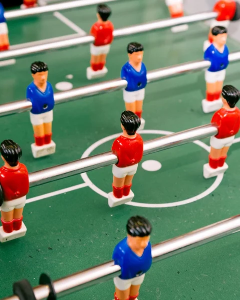 Red and Blue Table Football Players Arranged around Centre Circle