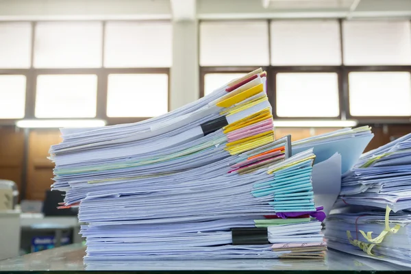 Messy office desk, Pile of unfinished paperworks