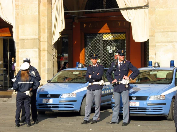 Italian police car and policemen