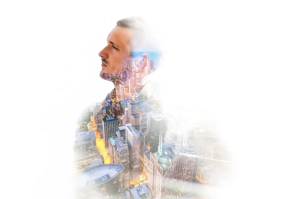 Double exposure portrait of face young bearded man thinking about big city. Dream and success concept, megalopolis background.