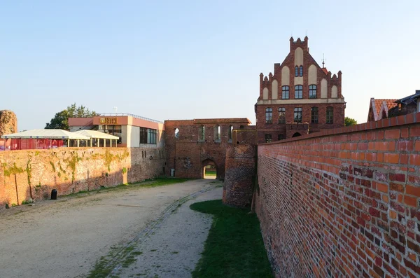 City walls and gothic Manor House in Torun, Poland.