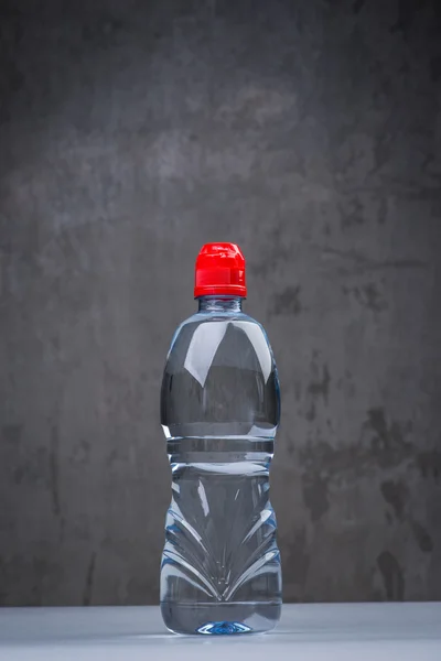 A bottle of fresh and cold water