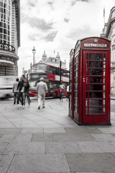 Red telephone box and red bus at London, BW