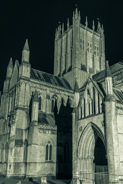 ENGLAND, WELLS - 20 SEP 2015: Wells Cathedral by night, black an