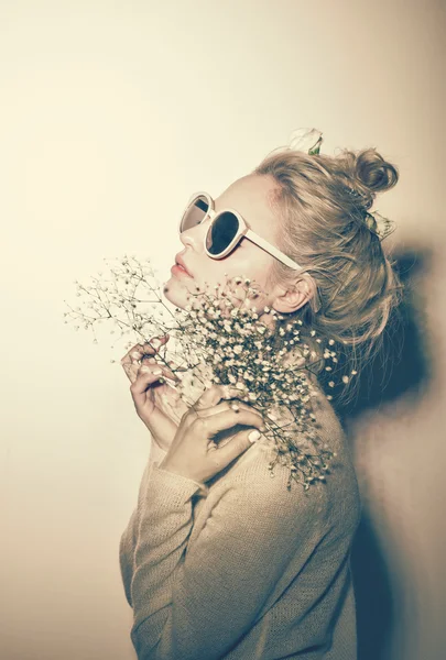 Fashion woman portrait. Sunglasses Hippi hair flowers on face