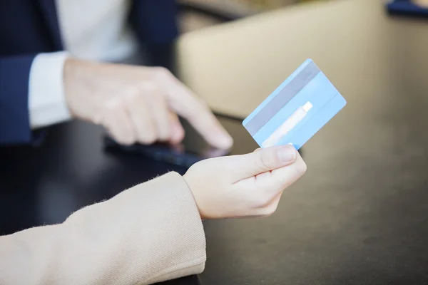 Couple using digital tablet  and credit card to make purchases online