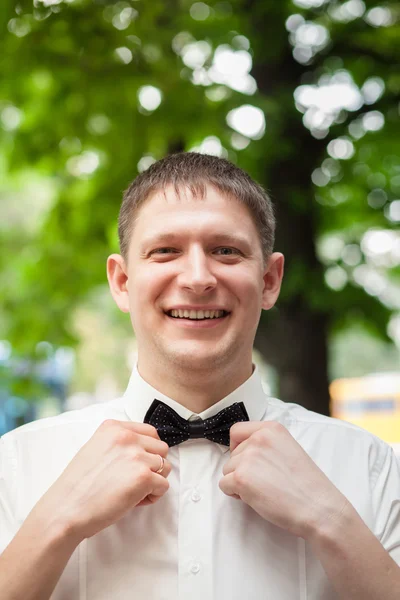 Cheerful groom at the wedding