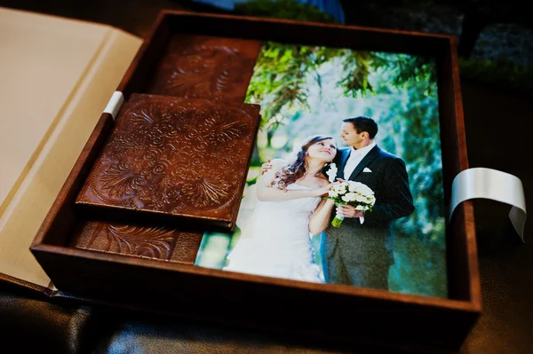 Brown leather wedding book and album