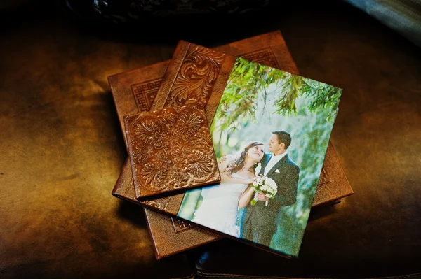 Brown leather wedding book and album